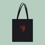 Heart & Y - Love In Any Language organic tote bag in black with red logo, eco-friendly and lightweight for everyday use.
