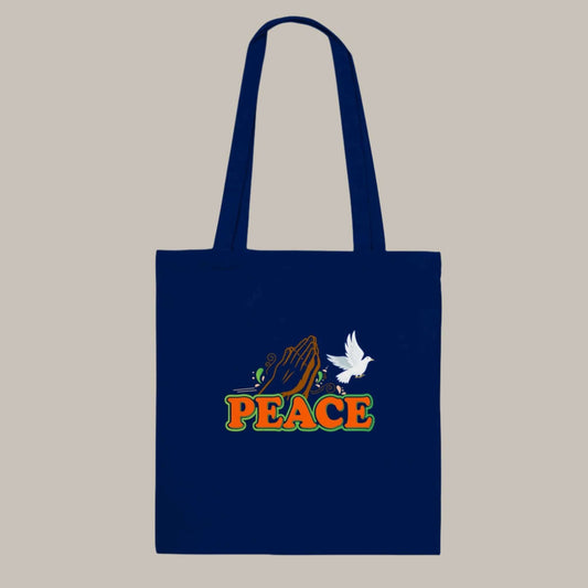 naby ble tote bag with a white dove pray hands and the word peace in red with green outline